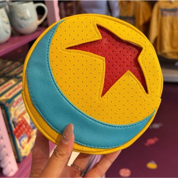 Disney Handbags - Disney Parks Pixar Pin bag crossbody or belt bag